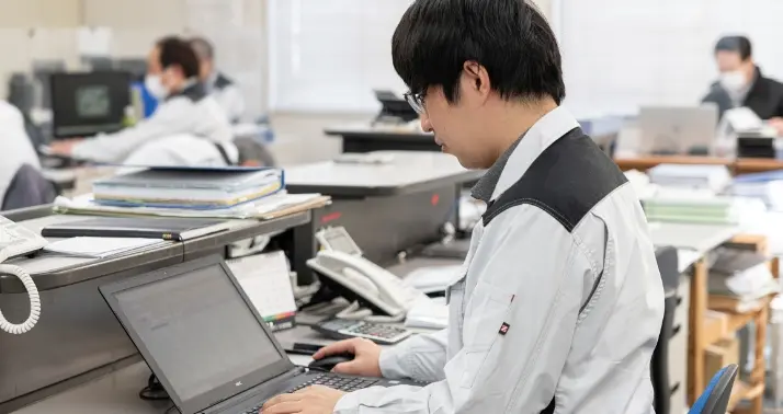 積算職